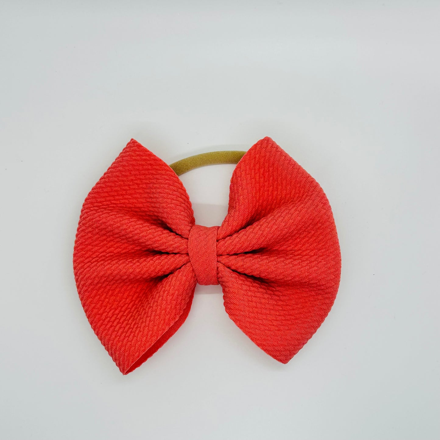 Nylon: coral Orange Bow