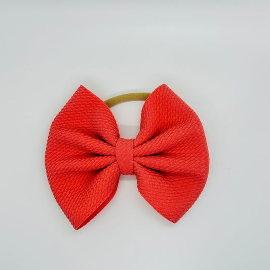 Nylon: coral Orange Bow